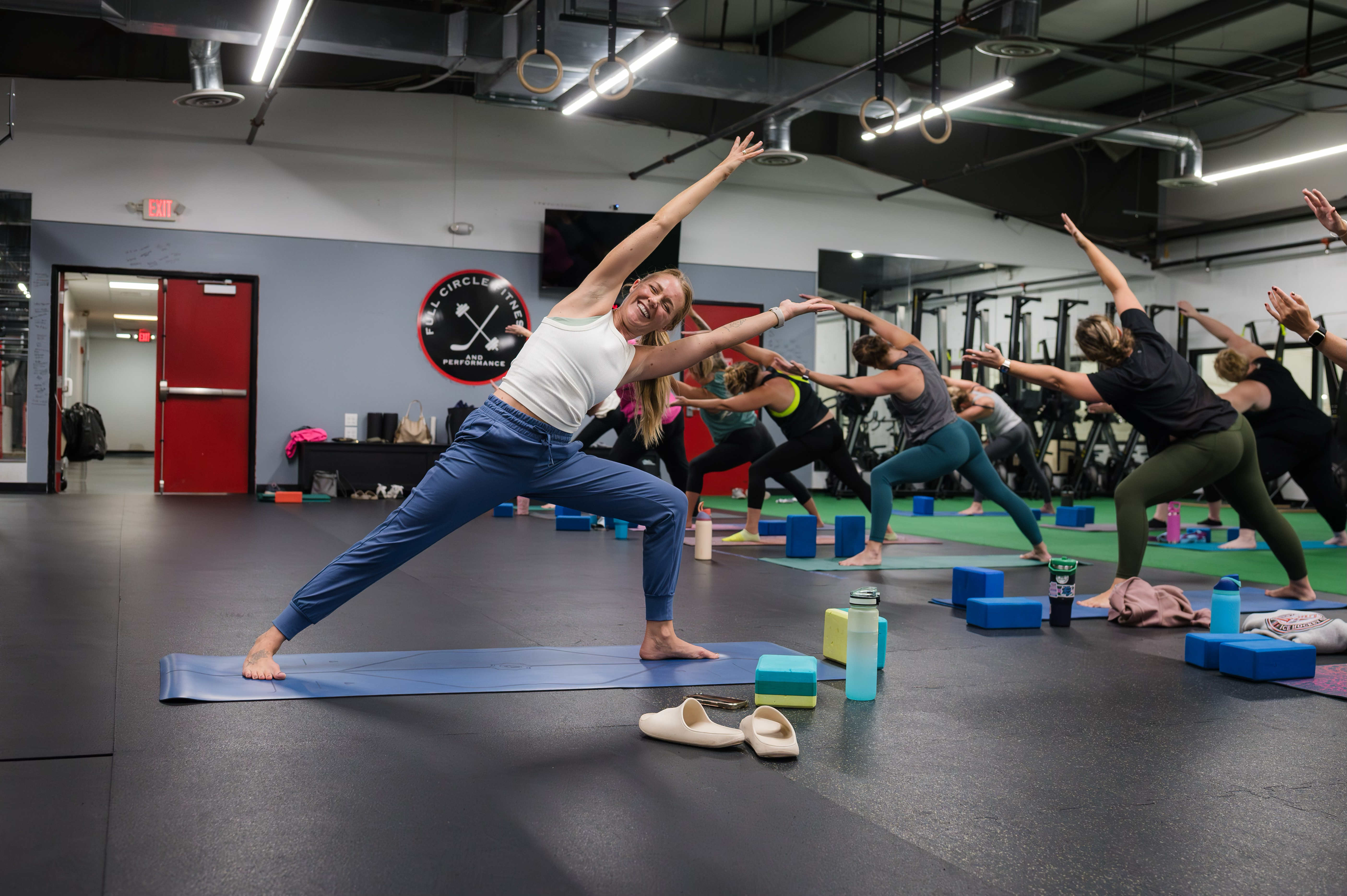 Heather Hughes leading yoga class at Full Circle Fitness