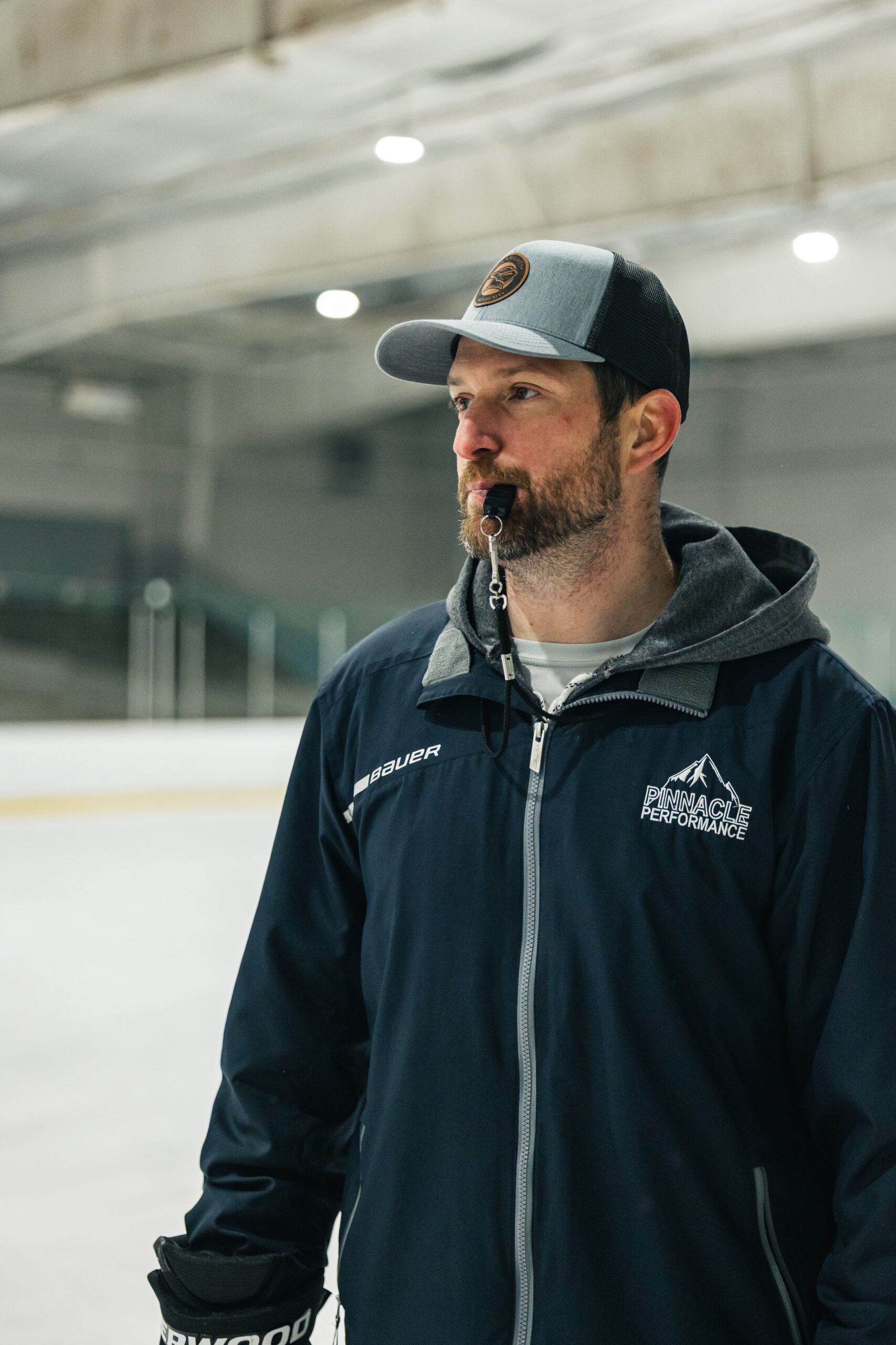 Coach Jeremiah Trostle watching youth athletes train York PA